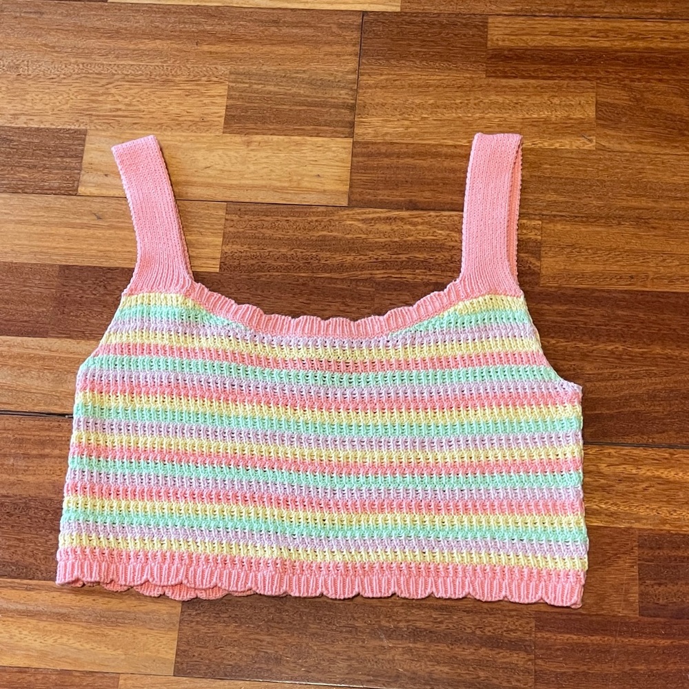 Size Small but fits like a Medium or maybe even a Large